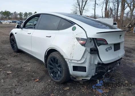 2021 Tesla Model Y Long Range Dual Motor All-Wheel Drive z USA, uszkodzony, nr VIN 5YJYGDEE6MF077084